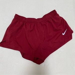 Nike burgundy running shorts. Size L
